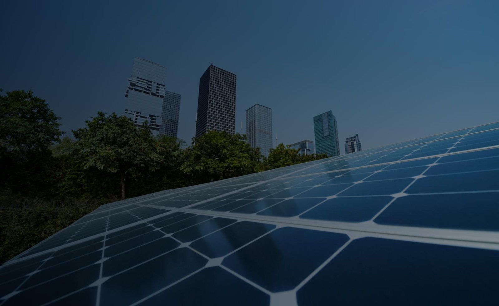 Solar panel close up with view of city.